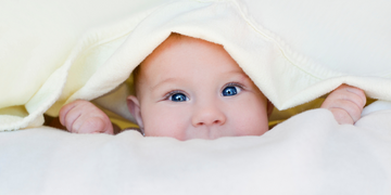 baby under blanket