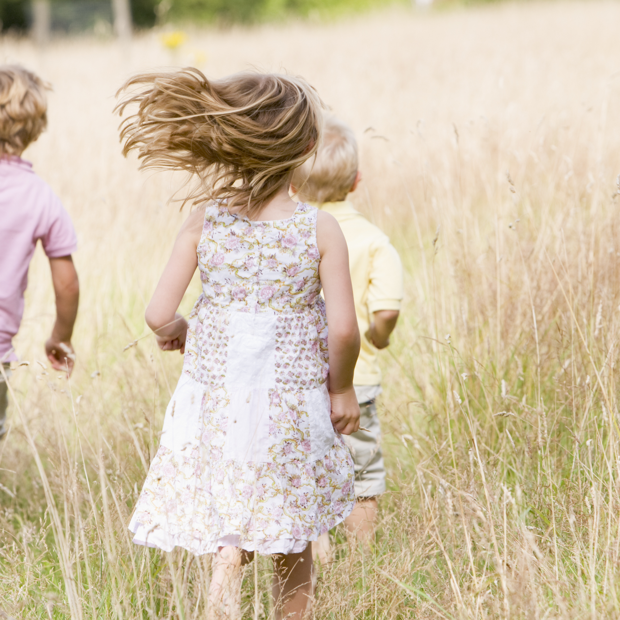 children running on meadows